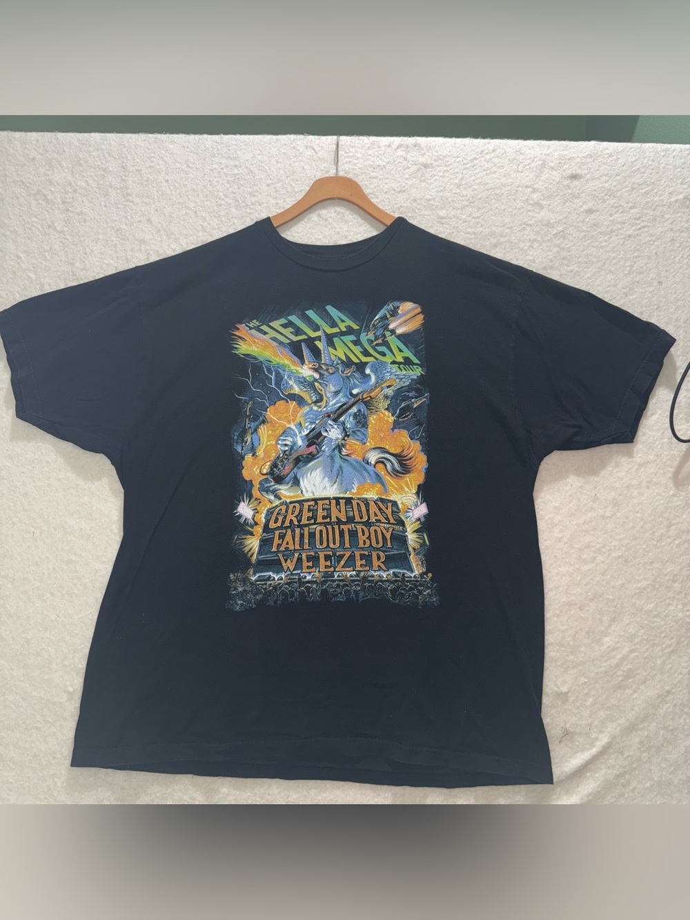 The Hella Mega  Tour 2021 T-shirt featuring Green Day, Fall Out Boys, & Weezer.